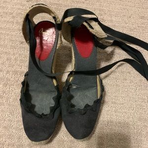 Christian Louboutin black canvas espadrilles.